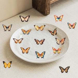 Autocollants de papillons orange réalistes sur lin pour la décoration artisanale