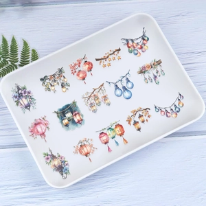 Flat lay of watercolor PET lantern stickers including vintage lamps and string lights