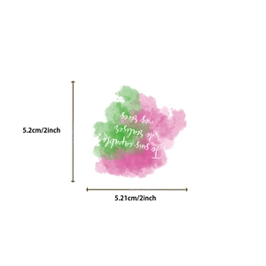 Watercolor motivational sticker detail showing French text and 5.2cm square size