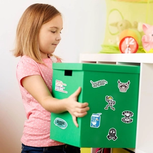 Girl holding green storage box decorated with waterproof prank meme stickers and funny cartoons