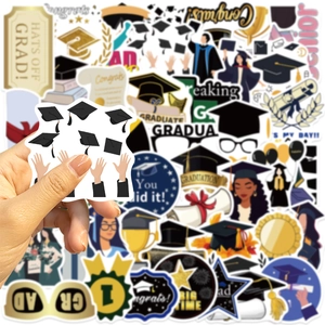 Detail of waterproof graduation stickers featuring students throwing caps and congrats text