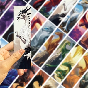 Detailed close-up of a dragon themed paper bookmark with artistic fantasy illustrations