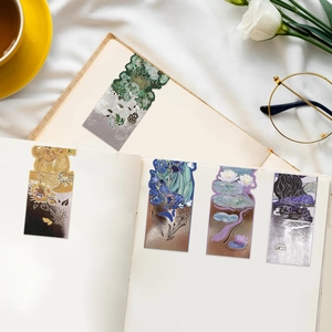 Detailed macro view of 5 vintage art magnetic bookmarks with Van Gogh oil painting prints
