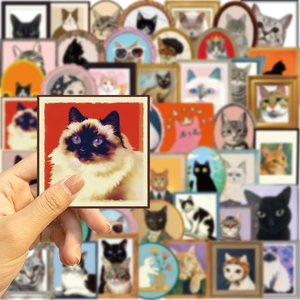 Close-up of waterproof cat portrait stickers with vintage frame designs for DIY decor