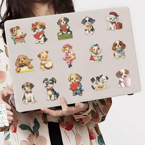 Detailed view of 14 vintage puppy stickers on laptop back for DIY decoration