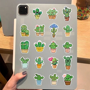 50pcs holographic cartoon cactus stickers on a grey tablet with shimmering laser finish