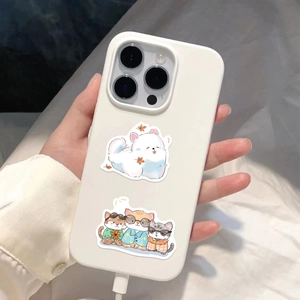 Close-up of matte white phone case featuring cute cartoon dog and cat illustrations