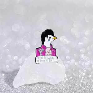 Funny gentleman pigeon enamel pin with purple suit and music lyrics in sparkling setting