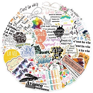 Detailed view of French inspirational stickers with floral and rainbow designs