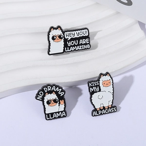 Three-piece alpaca enamel pin set with cute black and white sheep cartoon designs