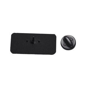 Detail view of the black rectangular metal pin back base and rubber clutch fastener