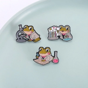 Three-piece set of cartoon frog scientist enamel pins for lab and medical research