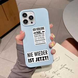 Detail of light blue iPhone case featuring German motivational text and matte texture