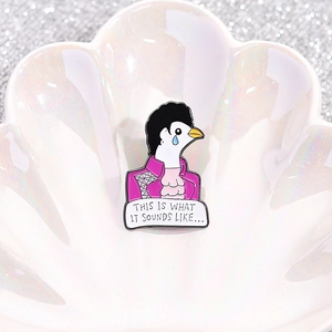 Prince tribute enamel dove pin in purple tuxedo with song lyric detail for apparel