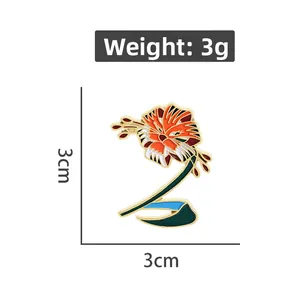 Detailed view of enamel tiger lily brooch measuring 3cm by 3cm with 3g weight mark