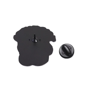 Detail of metal pin back with black rubber clutch and secure needle on white background