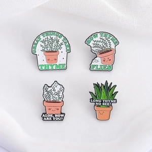 Set of four cute cartoon potted plant enamel pins featuring aloe and thyme designs
