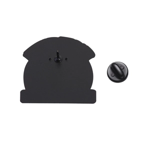 Detail view of the black enamel pin back with a secure rubber clutch on a white background