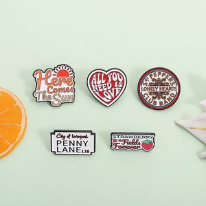 Beatles music series enamel pin set featuring classic song titles and iconic drum design
