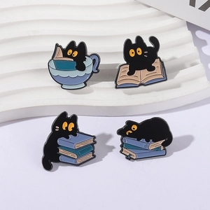 Set of 4 cute black cat enamel pins featuring coffee cups and books on a white background