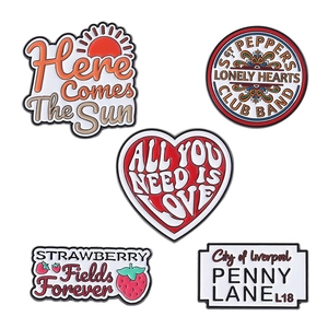 5-piece Beatles music enamel pins set featuring classic song lyrics and retro designs