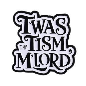 Black and white enamel pin with 'TWAS THE TISM, M'LORD floral script on white background