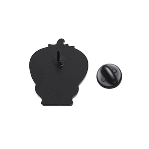 Detail showing the back of the black enamel pin with a durable rubber butterfly clutch