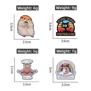 Detail of creative enamel pins featuring humorous animal designs and witty quotes