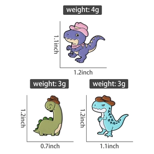 Macro view of cartoon dinosaur enamel pins with size and weight measurement details