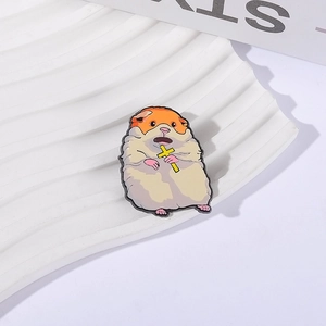 Cartoon hamster enamel pin holding a yellow cross made of high-quality alloy metal