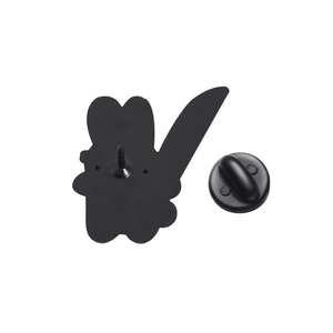 Detail of the brown rabbit enamel pin reverse side with sharp needle and rubber clutch