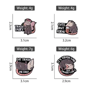 Set of four cartoon opossum enamel pins with humorous Trash Fairy slogans on white background