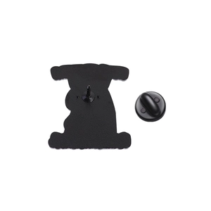 Detail view of the black enamel pin back with a durable rubber clutch fastener