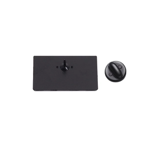 Detailed back view of the rectangle metal badge with a secure black rubber pin clutch