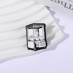 Pin's émaillé machine à fantômes avec texte Grab a Ghost sur fond blanc ondulé