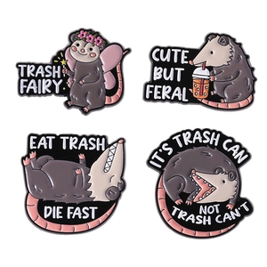 Set of four cute opossum enamel pins with creative English quotes in cartoon style