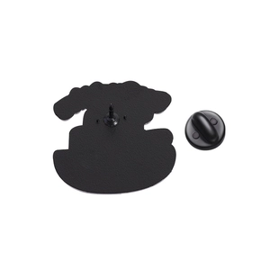 Detail view of the matte black enamel pin back with a secure rubber clutch fastener