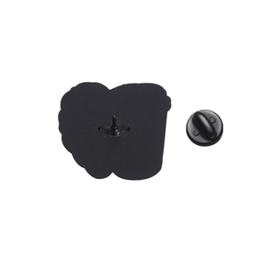 Detail view of the black enamel pin back featuring a secure rubber clutch fastener