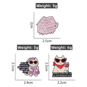 Detailed view of enamel cat pins with weight and dimensions for pink house and stylish cats