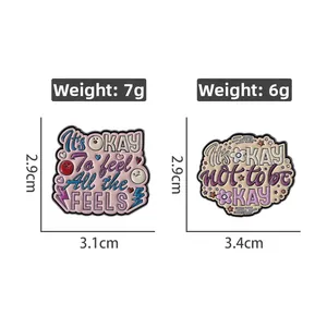 Detail view of It's OK enamel pins with dimensions and weight measurements