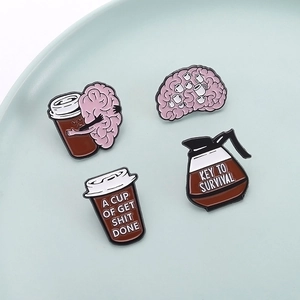 Creative coffee and brain enamel pin set featuring funny slogans and artistic designs