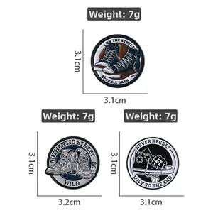 Detailed view of vintage canvas shoe enamel pins with size and weight measurements