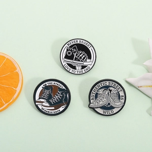 Three retro sneaker enamel pins featuring Never Regret and Authentic Street round metal designs
