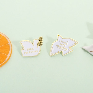 Set of 2 white dove enamel pins with olive branch and Free Palestine political slogan