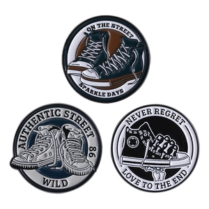 Vintage canvas sneaker enamel pin set featuring street style designs and metal plating