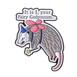 Cute Fairy Godpossum enamel pin with wings and magic wand featuring humorous text