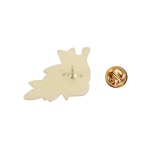 Detailed back view of metal ribbon brooch with secure butterfly clasp and gold finish