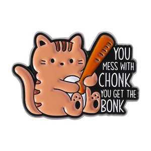 Funny orange tabby cat enamel pin with bat and You Mess With Chonk You Get The Bonk text
