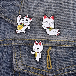 Three cute lucky cat enamel pins set for backpacks with golden coin detail