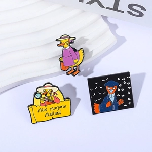 Cartoon duck detective enamel pin set with magnifying glass and purple outfit design
